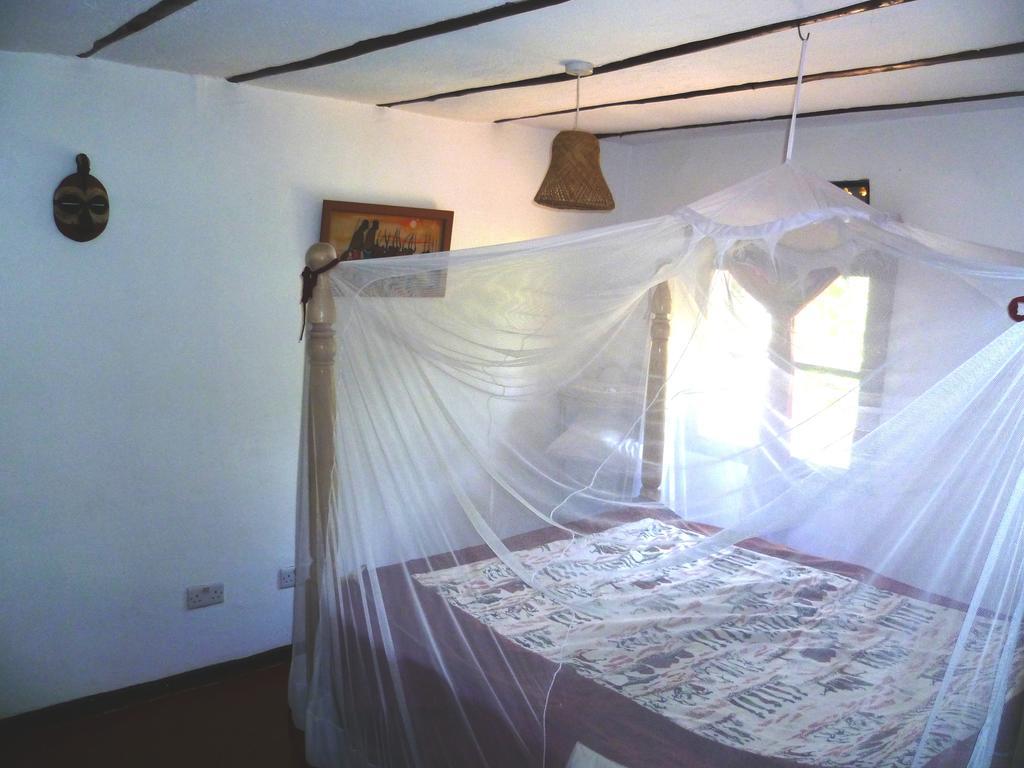 Alison & Dave'S Guesthouse Энтеббе Номер фото