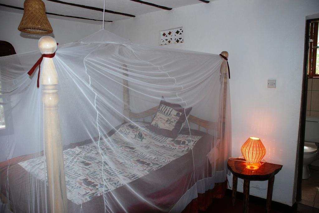 Alison & Dave'S Guesthouse Энтеббе Номер фото